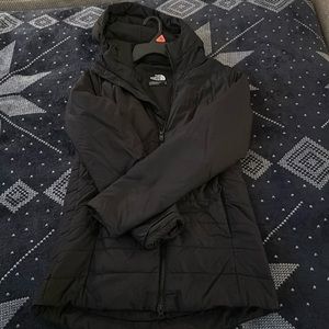 The North Face Woman’s Sm Winter Jacket with Hood.
